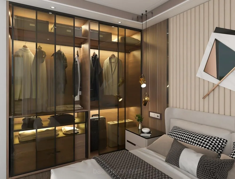 a bedroom with a bed and a wardrobe