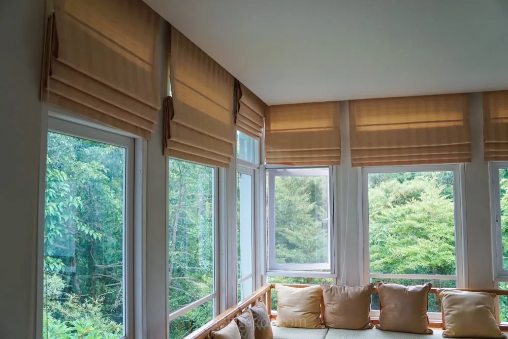 a window seat with pillows